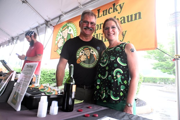 Than Wright and Terri McCarthy-Wright of Lucky Leprechaun Winery near Lenhartsville support Pints for Pups at Classic Harley Davidson on Saturday, July 18, 2026. (BILL UHRICH/READING EAGLE)