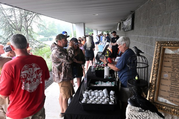Crowds sample the brews during Pints for Pups at Classic Harley Davidson on Saturday, July 18, 2026. (BILL UHRICH/READING EAGLE)
