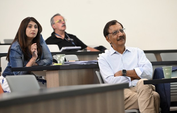 Jay Sidhu listens as Sandy Solmon, founder of Sweet Street Desserts in Reading, speaks during his entrepreneurial boot camp at Alvernia University on Thursday, June 25, 2026. (BILL UHRICH/MEDIANEWS GROUP)