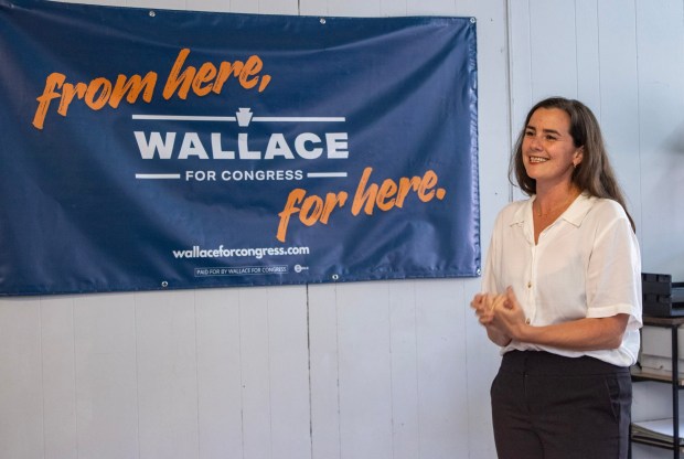Rachel Wallace addresses visitors at her newly opened Market Street campaign office. (AISHWARYA BEHL/STAFF PHOTO)