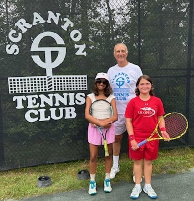The 12th annual Lackawanna County Open Tennis Tournament will take place at Scranton Tennis Club, 1029 Morgan Highway, Clarks Summit, on July 9-12. The tournament will feature men's and women's singles and doubles in A and B Divisions. The B Division events are open to players who have NTRP ratings of 3.0 or below. All players must reside in Lackawanna County or in a county contiguous to Lackawanna County. Entry fee for singles is $25 for STC members and $30 for non-members. For doubles, it is $15/person for STC members and $20/person for non-members. The club will provide balls and awards for all finalists. Entry fee must be paid before the entry deadline of Monday, July 6. Players may drop their entry form and check in the mailbox on the porch at the club or mail it to Scranton Tennis Club, P.O. Box 678, Clarks Summit, PA 18411. Checks should be made out to Scranton Tennis Club. The link for the Venmo payment is account.venmo.com/u/ScrantonTennisClub. For information, contact STC tournament director John Weiss at 570-497-9003. Pictured with Weiss, in back, are last year's Women's A Singles finalists, front, from left, Amishi Amit, finalist, and Tea Amerise, champion. (Submitted)