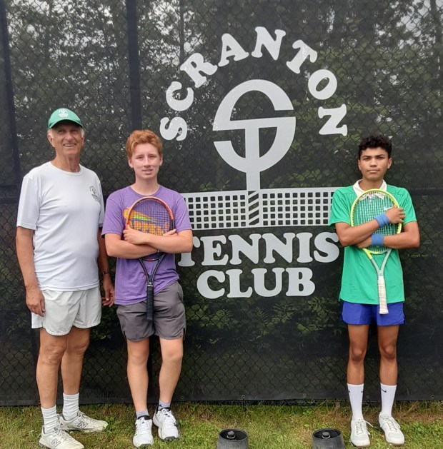 The Scranton Tennis Club, 1029 Morgan Highway, Clarks Summit, will hold a Junior Tennis Tournament on Aug. 4-7 with play scheduled each afternoon. Competition will be held in Boys and Girls Singles in 14 and Under and 18 and Under categories. Young players can get competitive experience with minimal financial investment. There is also a consolation tournament for first-time losers, so everyone gets to play at least two matches. Entry fee for each event is $10 for STC members, $20 for non-members. The club will provide balls and awards for all finalists. Entry blanks are available at the club. The entry fee must be paid before the entry deadline of Saturday, Aug. 1. Players may drop their entry form and check in the mailbox on the porch at the club. Checks should be made out to Scranton Tennis Club. Players can also use Venmo to pay the entry fee (account.venmo.com/u/ScrantonTennisClub). From left, John Weiss, tournament director, stands with last year's Boys 18 and Under finalists, William Arp, finalist, and Alex Harrison, champion. (Submitted)