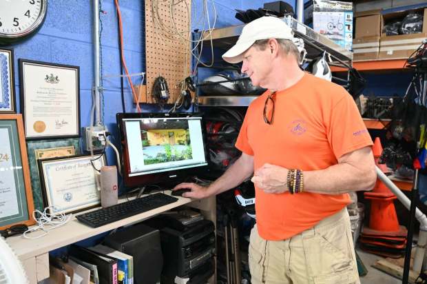 Gene McDonough, Board President of the Anthracite Bicycle Coalition, looks back on the development of Cycle Kitchen, which provides area residents with affordable bikes and maintenance. (GERI GIBBONS/STAFF PHOTO)