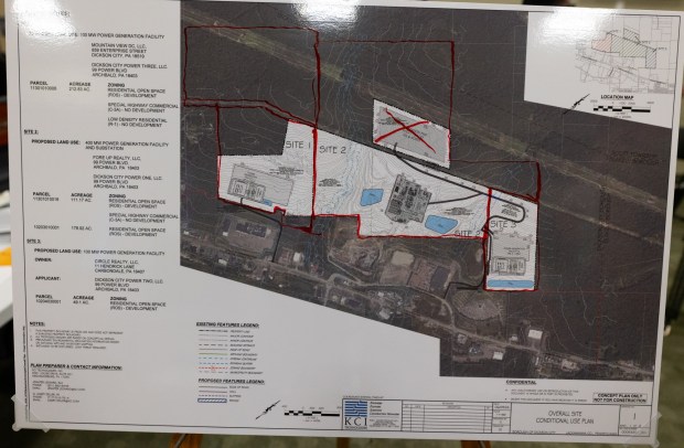 A site plan marked with parcel sizes appeared on an easel during a zoning hearing in the Dickson City Borough Building to consider special exceptions for three natural gas power plants on Wednesday, June 10, 2026. (FRANK WILKES LESNEFSKY / STAFF PHOTO)