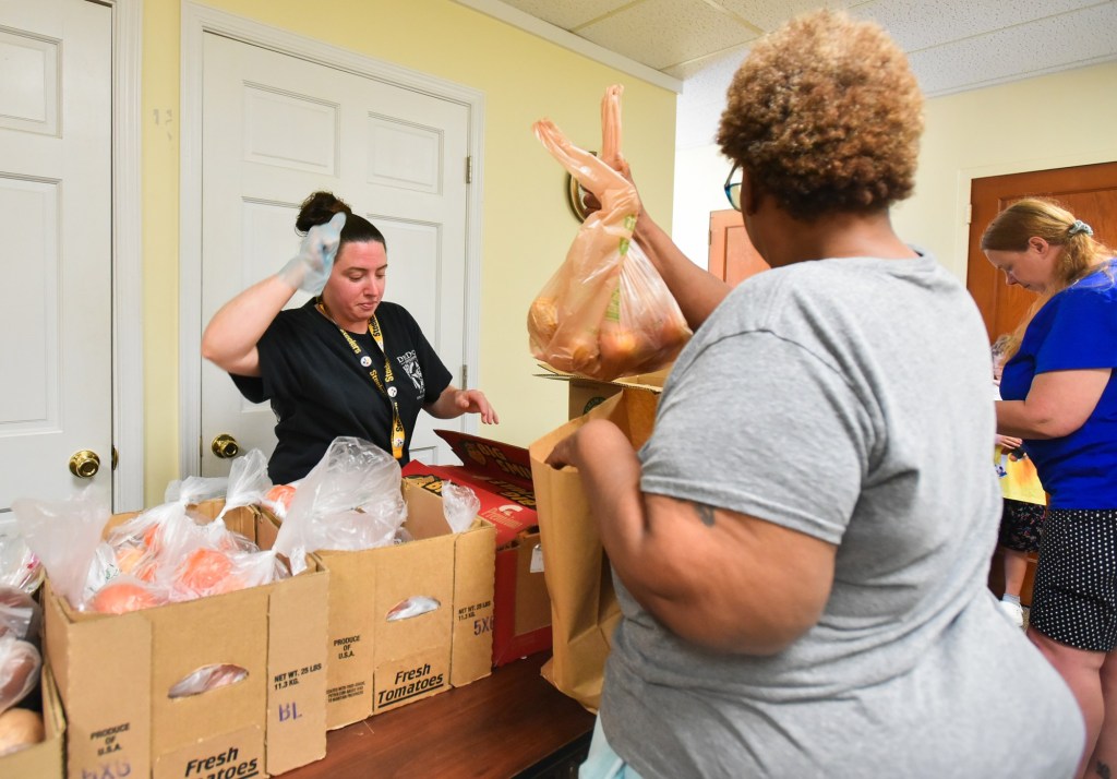 Pop-up pantry aids Hilltop residents hit by power outage