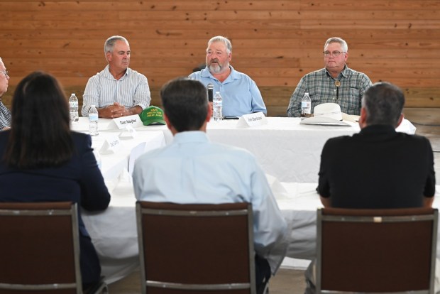 Local farmers Dan Naylor, Jim Barbour, and Tim Jaggars answer questions during the agricultural roundtable hosted by state Treasurer Stacy Garrity at Eckel Farms in Newton Twp. Thursday, July 30, 2026. (SEAN MCKEAG / STAFF PHOTOGRAPHER)