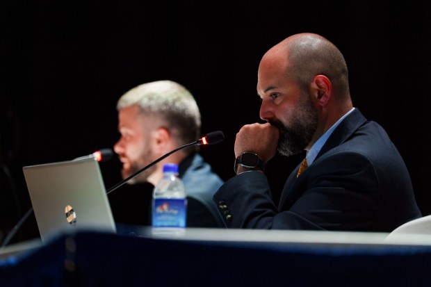Attorney Justin Richards, right, and expert witness Micheal Cork, left, discuss the proposed Wildcat Ridge Data Center Campus at Valley View High School in Archbald, Pa., on Monday, July 6, 2026. (ISAAC DIAZ/STAFF PHOTO)