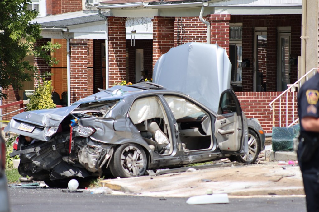 Allentown crash sends car into home; man charged