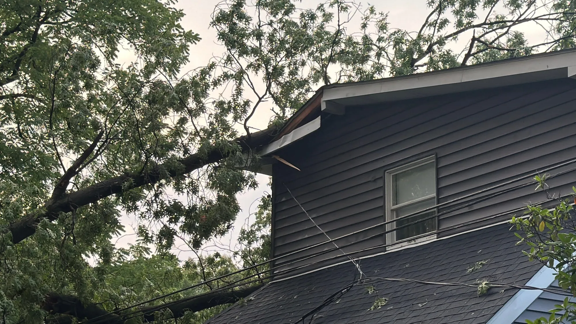 Storm damage is seen in Alburtis on Friday evening, July 3, 2026. Severe storms moved through the Lehigh Valley, cutting power to thousands amid days of extreme heat just as Fourth of July celebrations were getting started. (Rich Rolen/Special to The Morning Call)