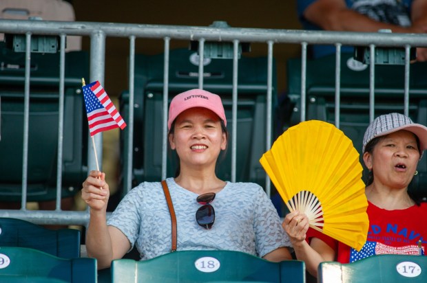 Attendees keep cool Friday, July 3, 2026, during the Liberty Ignited celebration marking America's 250th birthday at Coca-Cola Park in Allentown. (Jonathan Broady/Special to The Morning Call)