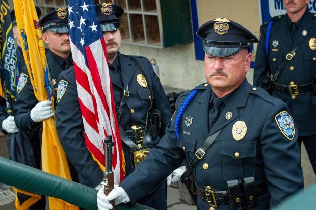 Phillipsburg police officers prepare to take part in the presentation of the colors Friday, July 3, 2026, during the Liberty Ignited celebration marking America's 250th birthday at Coca-Cola Park in Allentown. (Jonathan Broady/Special to The Morning Call)