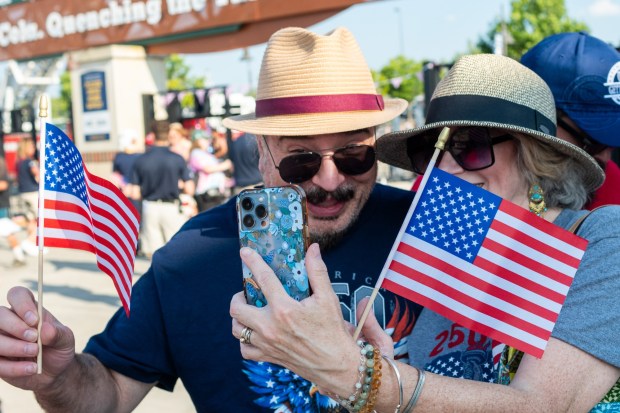 Attendees take a selfie at the entrance to Coca-Cola Park Friday, July 3, 2026, during the Liberty Ignited celebration marking America's 250th birthday in Allentown. (Jonathan Broady/Special to The Morning Call)