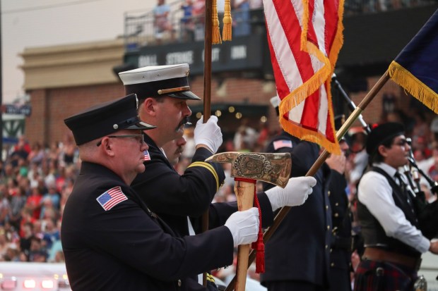 The Allentown Fire Department honor guard stands at attention during Liberty Ignited at Coca-Cola Park on Friday, July 3, 2026, in Allentown. Part of wider America 250 celebrations happening both in the Lehigh Valley and nationwide, Liberty Ignited featured a Pa. Shakespeare Festival rendition of "Who's on First?", an exhibition of historic American cars by the NB Center for American Automotive Heritage and a life sized paper mache Liberty Bell courtesy of Easton Rotary Club (Jon Chiu/The Morning Call)