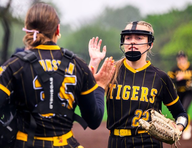 Northwestern Lehigh's pitcher Emma Freeman and catcher Abby Dunstan exchange high fives after an inning against Notre Dame Green Pond on Wednesday, May 14, 2025, during a Colonial League semifinal softball game at Cynthia L. Blaschak Field at Cedar Crest College in Allentown. (April Gamiz/The Morning Call)