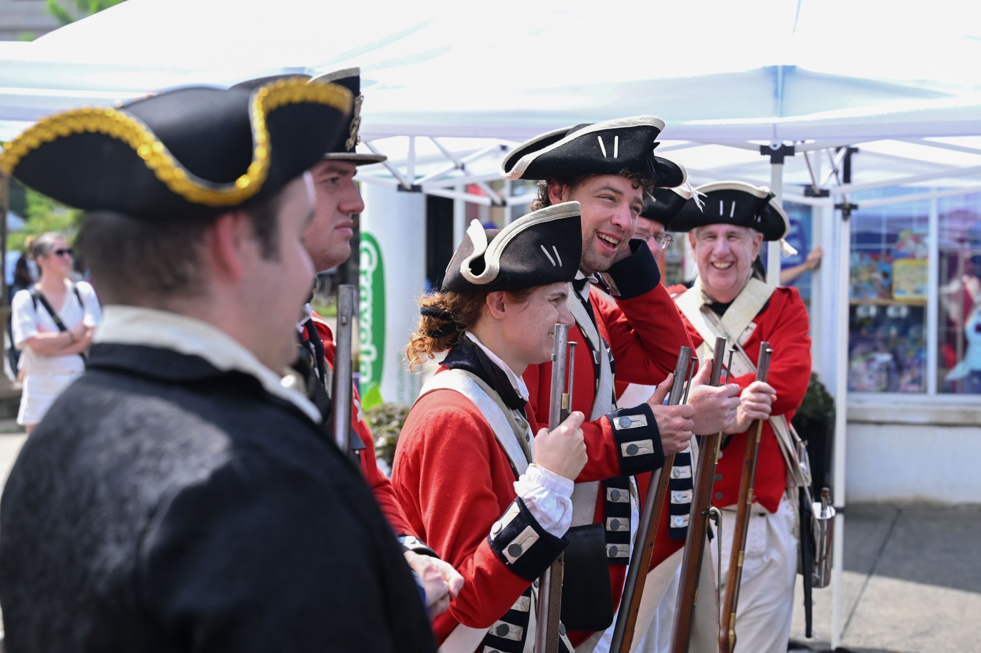 Members of the 1st Battalion of New Jersey Volunteers reenactment group stand by their tent Saturday, July 11, 2026, during the Heritage Day festival in Easton. The festival showcases local and regional history and the heritage of many groups with reenactment events, recreational activities and musical performances. (Jon Chiu/The Morning Call)