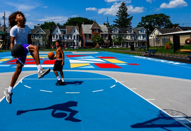 Randy, 12, and Jayson, 11, both of Bethlehem play basketball despite the hot weather Monday, July 13, 2026, at Friendship Park in Bethlehem. The Lehigh Valley is under a heat advisory from the National Weather Service through 8 p.m. Wednesday.(April Gamiz/The Morning Call)