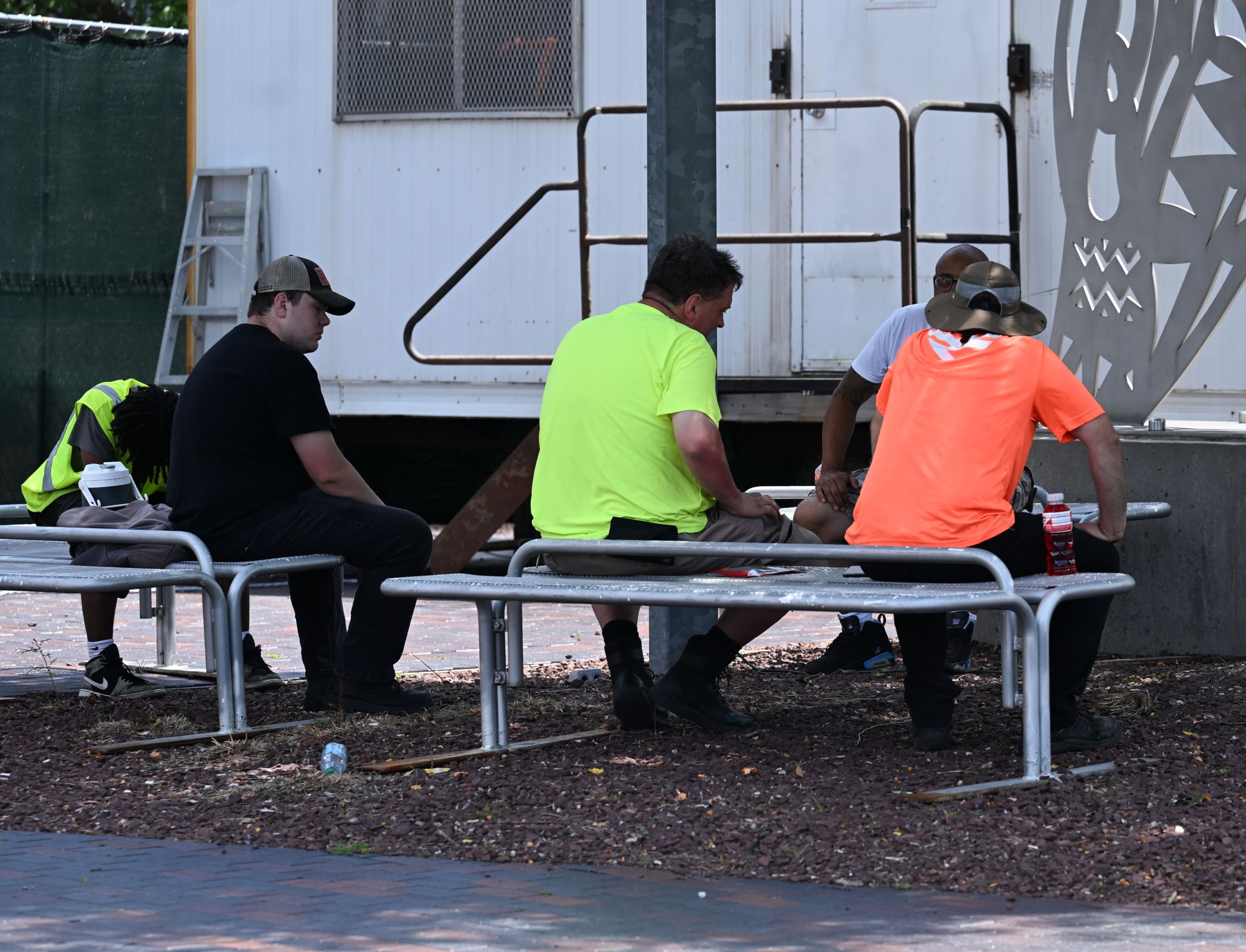 Workers rest in the shade during preparations for Musikfest on Wednesday, July 22, 2026, in Bethlehem. The 10-day, free music festival in both North and South Side Bethlehem runs July 31-Aug. 9. (Jon Chiu/The Morning Call)