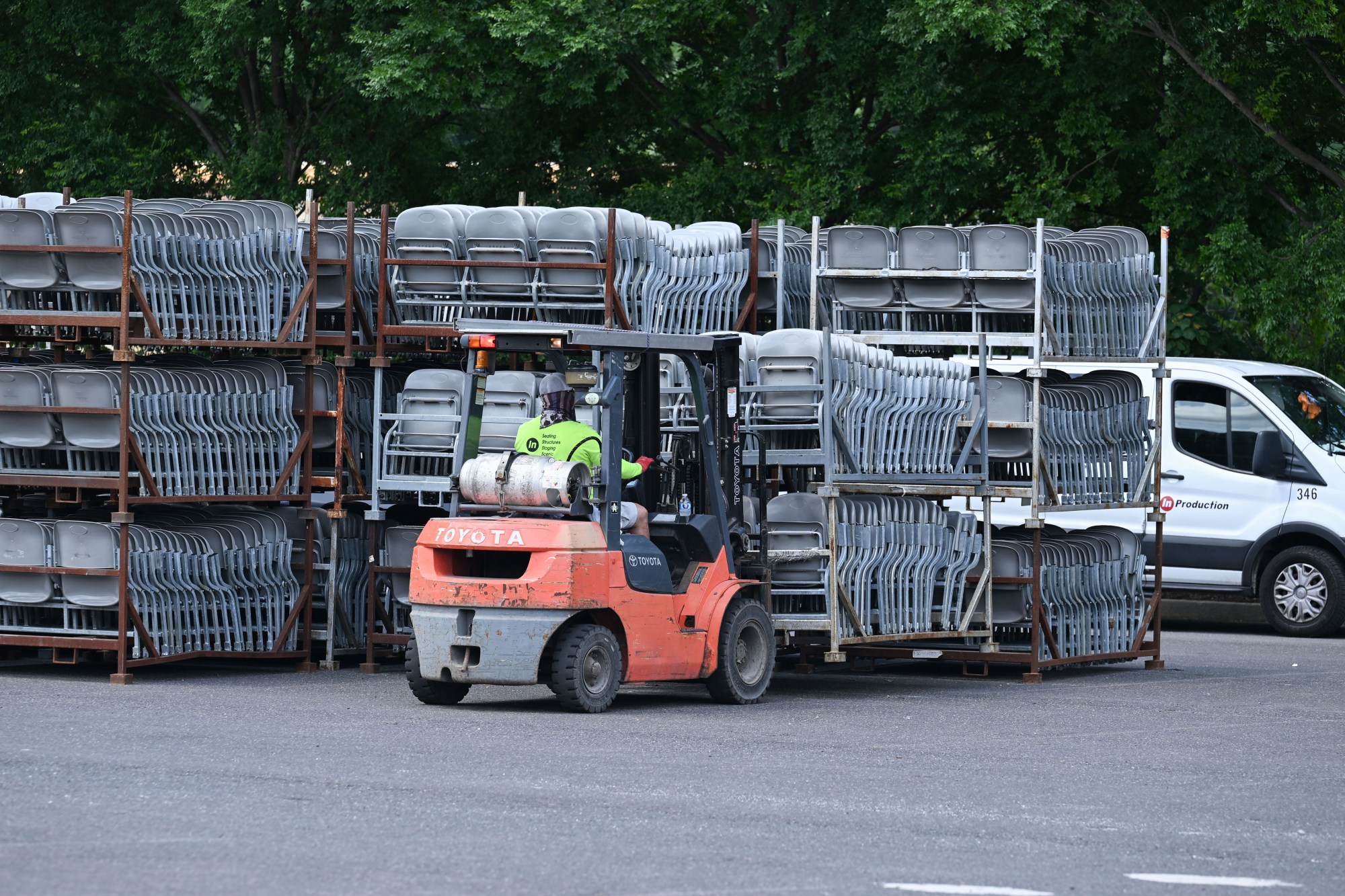 A forklift picks up rows of stacked seats to be assembled for Musikfest on Wednesday, July 22, 2026, in Bethlehem. The 10-day, free music festival in both North and South Side Bethlehem runs July 31-Aug. 9. (Jon Chiu/The Morning Call)