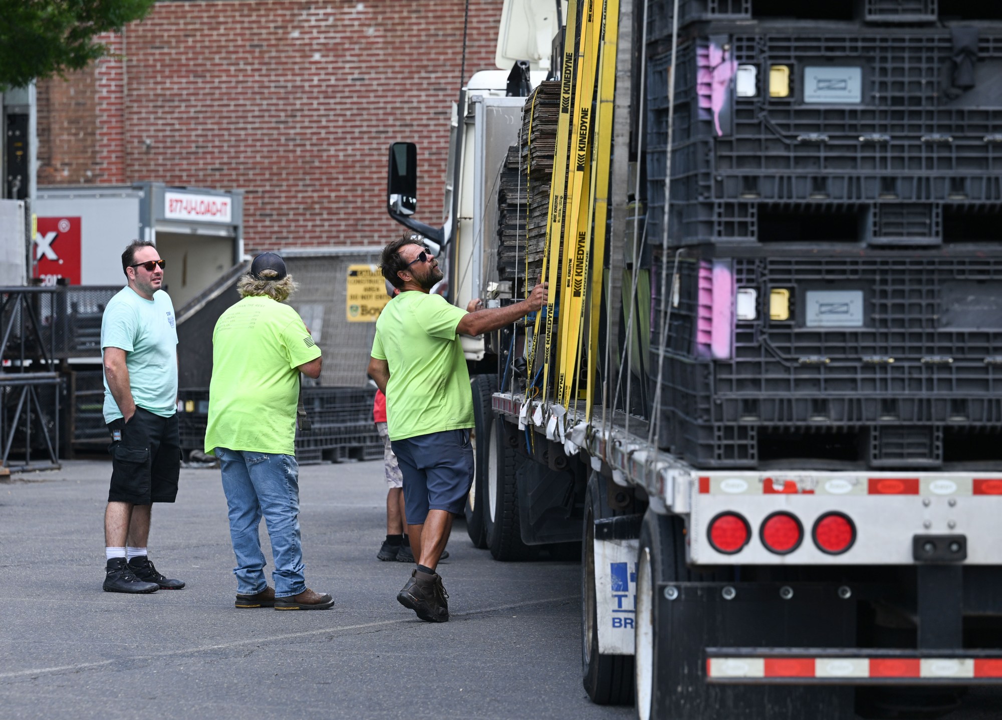 Workers prepare to unload a truck during preparations for Musikfest on Wednesday, July 22, 2026, in Bethlehem. The 10-day, free music festival in both North and South Side Bethlehem runs July 31-Aug. 9. (Jon Chiu/The Morning Call)
