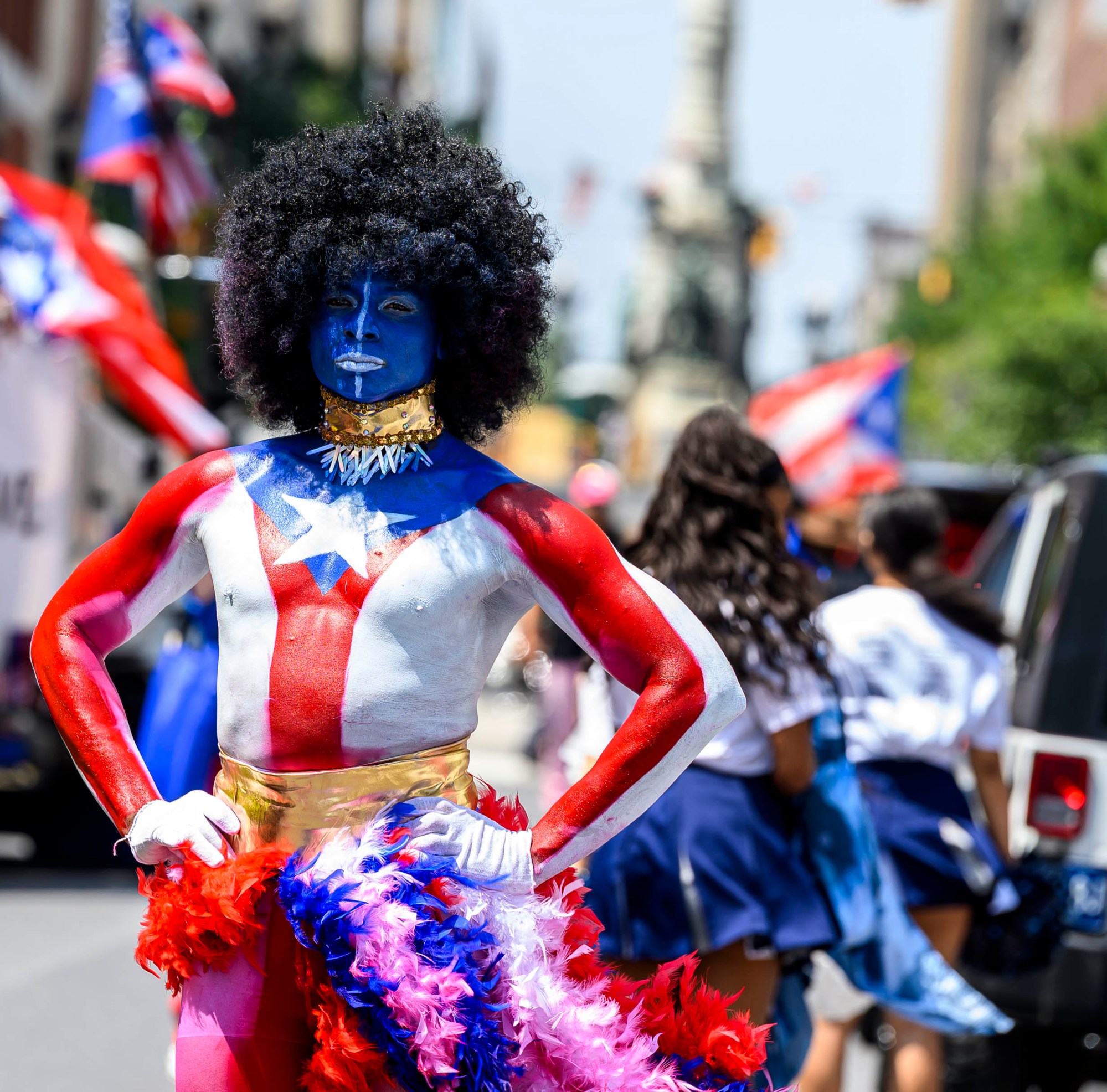 People celebrate during the annual Lehigh Valley Puerto Rican Day Parade on Sunday, July 19, 2026, in Allentown. The day's festivities, sponsored by Puertorrican Cultural Preservation, also included raising the Puerto Rican flag and a festival. (April Gamiz/The Morning Call)