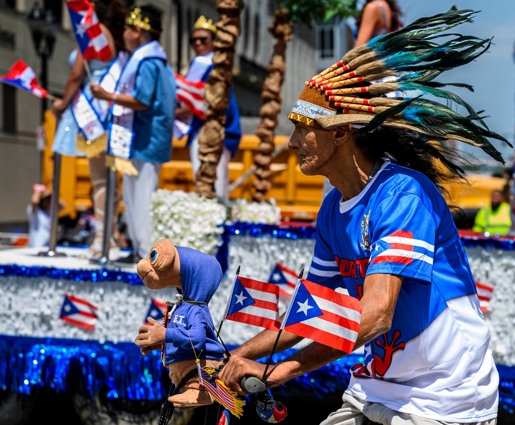 People celebrate during the annual Lehigh Valley Puerto Rican Day Parade on Sunday, July 19, 2026, in Allentown. The day's festivities, sponsored by Puertorrican Cultural Preservation, also included raising the Puerto Rican flag and a festival. (April Gamiz/The Morning Call)