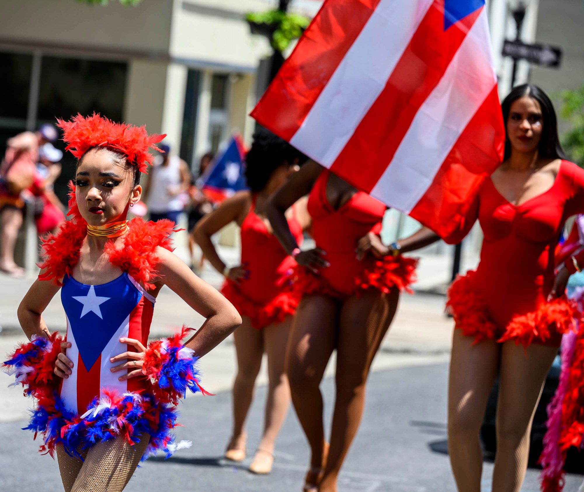 People celebrate during the annual Lehigh Valley Puerto Rican Day Parade on Sunday, July 19, 2026, in Allentown. The day's festivities, sponsored by Puertorrican Cultural Preservation, also included raising the Puerto Rican flag and a festival. (April Gamiz/The Morning Call)