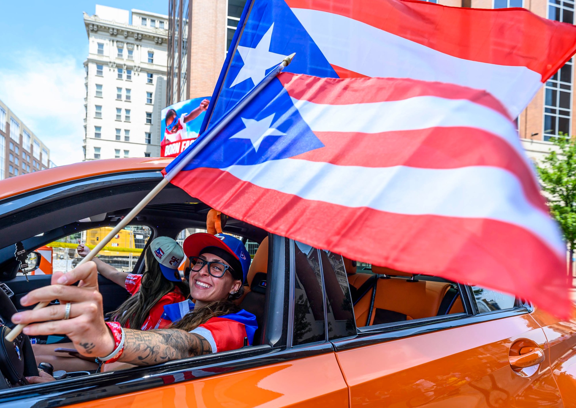 People celebrate during the annual Lehigh Valley Puerto Rican Day Parade on Sunday, July 19, 2026, in Allentown. The day's festivities, sponsored by Puertorrican Cultural Preservation, also included raising the Puerto Rican flag and a festival. (April Gamiz/The Morning Call)