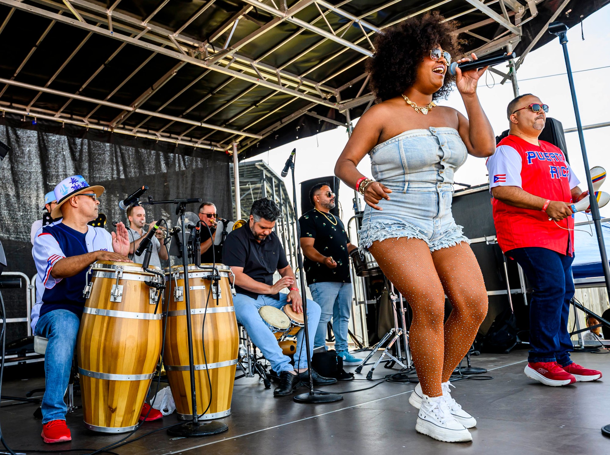 Héctor Rosado y su Orquesta Hache entertain the huge crowd during the annual Lehigh Valley Puerto Rican Day Festival on Sunday, July 19, 2026, at the Allentown Fairgrounds. The day's festivities, sponsored by Puertorrican Cultural Preservation, also included raising the Puerto Rican flag and a parade. (April Gamiz/The Morning Call)