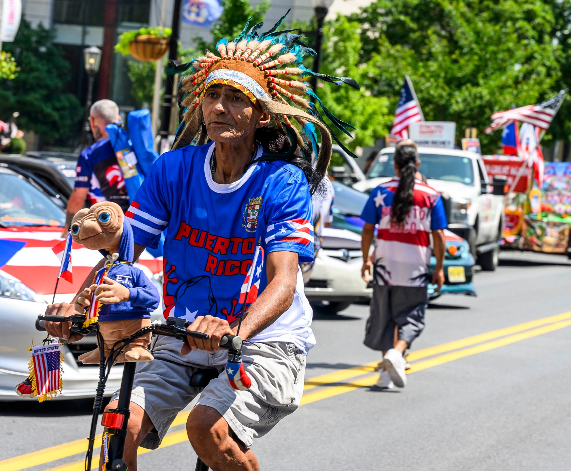 People celebrate during the annual Lehigh Valley Puerto Rican Day Parade on Sunday, July 19, 2026, in Allentown. The day's festivities, sponsored by Puertorrican Cultural Preservation, also included raising the Puerto Rican flag and a festival. (April Gamiz/The Morning Call)