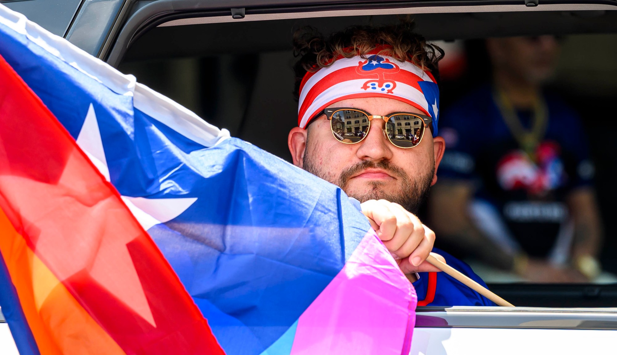 People celebrate during the annual Lehigh Valley Puerto Rican Day Parade on Sunday, July 19, 2026, in Allentown. The day's festivities, sponsored by Puertorrican Cultural Preservation, also included raising the Puerto Rican flag and a festival. (April Gamiz/The Morning Call)