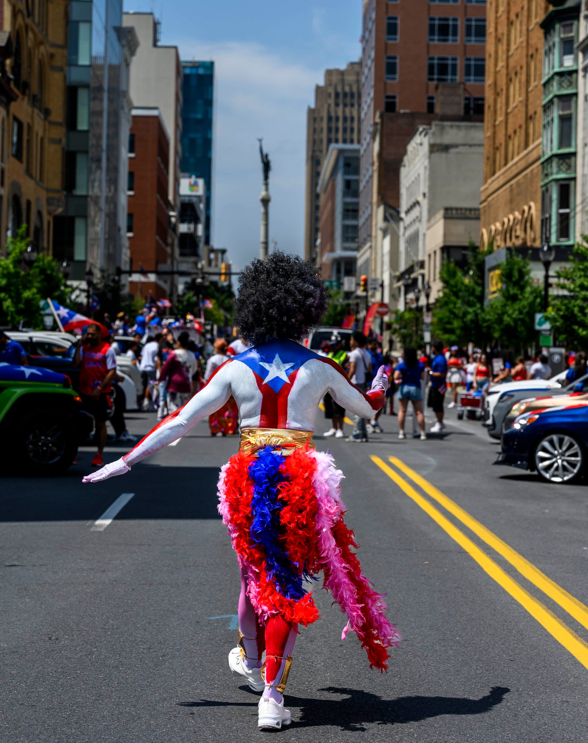 People celebrate during the annual Lehigh Valley Puerto Rican Day Parade on Sunday, July 19, 2026, in Allentown. The day's festivities, sponsored by Puertorrican Cultural Preservation, also included raising the Puerto Rican flag and a festival. (April Gamiz/The Morning Call)