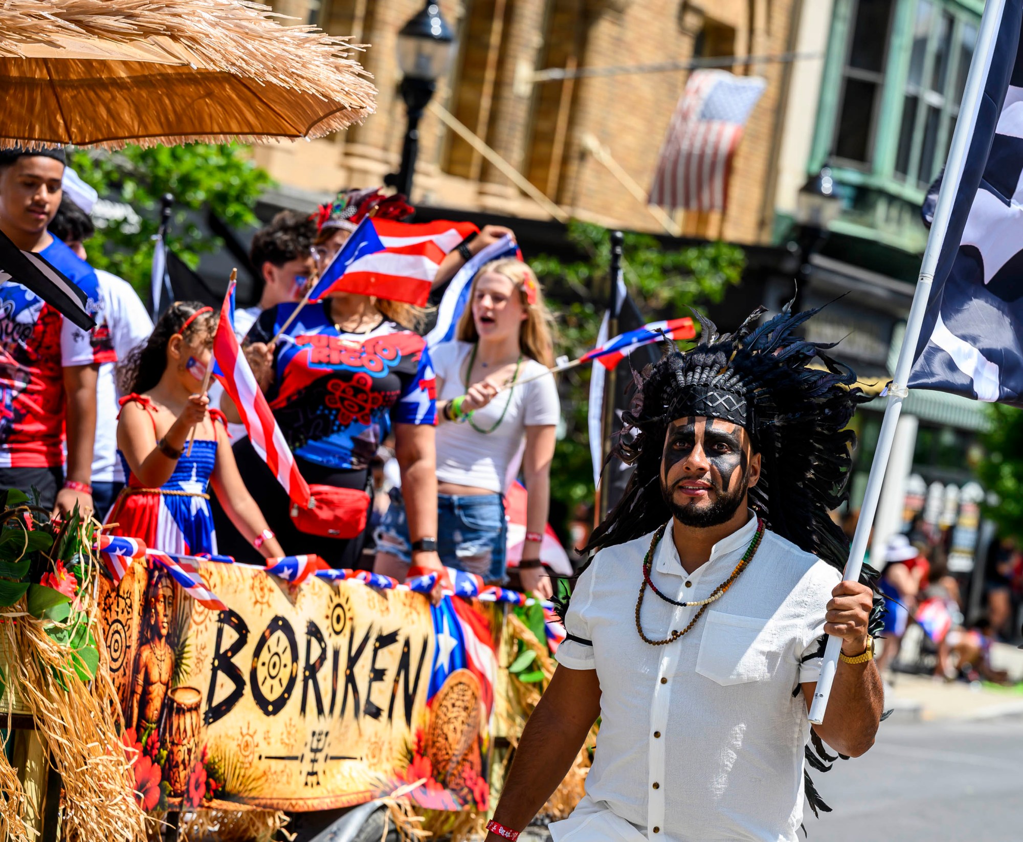 People celebrate during the annual Lehigh Valley Puerto Rican Day Parade on Sunday, July 19, 2026, in Allentown. The day's festivities, sponsored by Puertorrican Cultural Preservation, also included raising the Puerto Rican flag and a festival. (April Gamiz/The Morning Call)