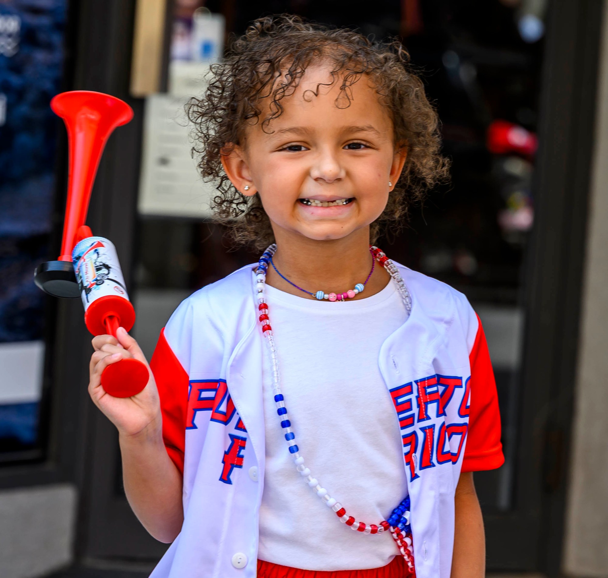 People celebrate during the annual Lehigh Valley Puerto Rican Day Parade on Sunday, July 19, 2026, in Allentown. The day's festivities, sponsored by Puertorrican Cultural Preservation, also included raising the Puerto Rican flag and a festival. (April Gamiz/The Morning Call)