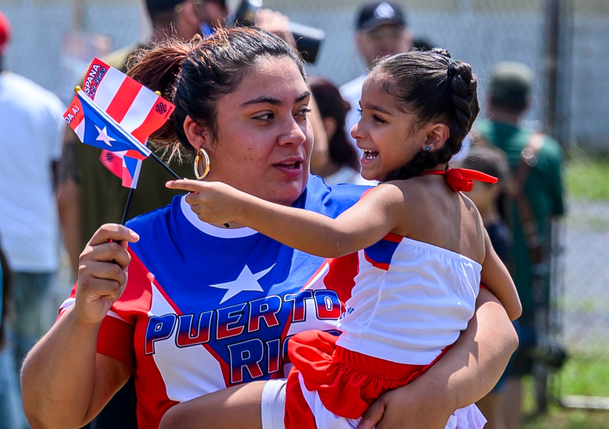 People celebrate during the annual Lehigh Valley Puerto Rican Day Festival on Sunday, July 19, 2026, at the Allentown Fairgrounds. The day's festivities, sponsored by Puertorrican Cultural Preservation, also included raising the Puerto Rican flag and a parade. (April Gamiz/The Morning Call)