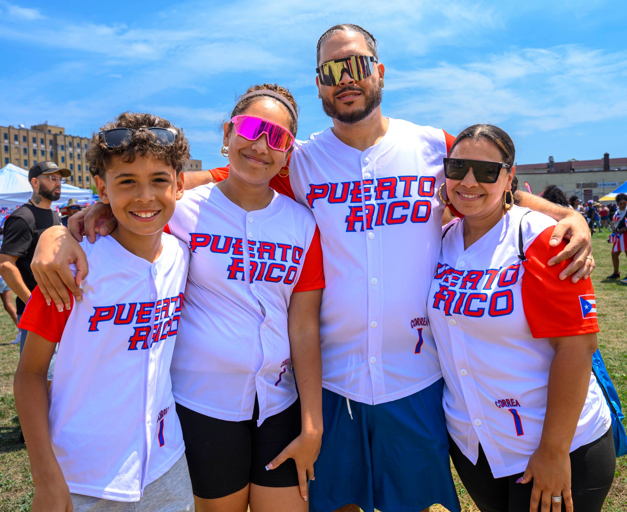 People celebrate during the annual Lehigh Valley Puerto Rican Day Festival on Sunday, July 19, 2026, at the Allentown Fairgrounds. The day's festivities, sponsored by Puertorrican Cultural Preservation, also included raising the Puerto Rican flag and a parade. (April Gamiz/The Morning Call)