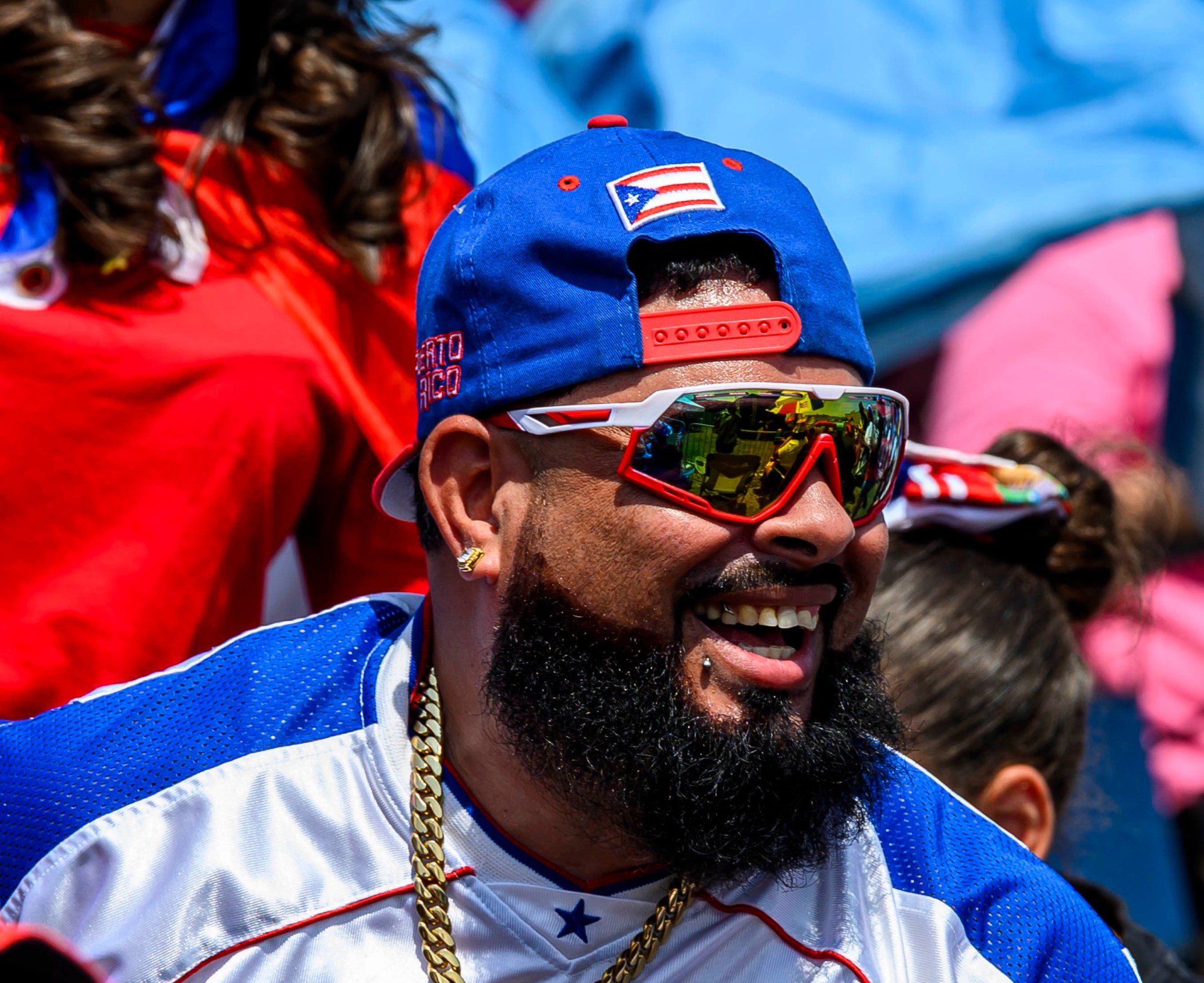 People celebrate during the annual Lehigh Valley Puerto Rican Day Festival on Sunday, July 19, 2026, at the Allentown Fairgrounds. The day's festivities, sponsored by Puertorrican Cultural Preservation, also included raising the Puerto Rican flag and a parade. (April Gamiz/The Morning Call)