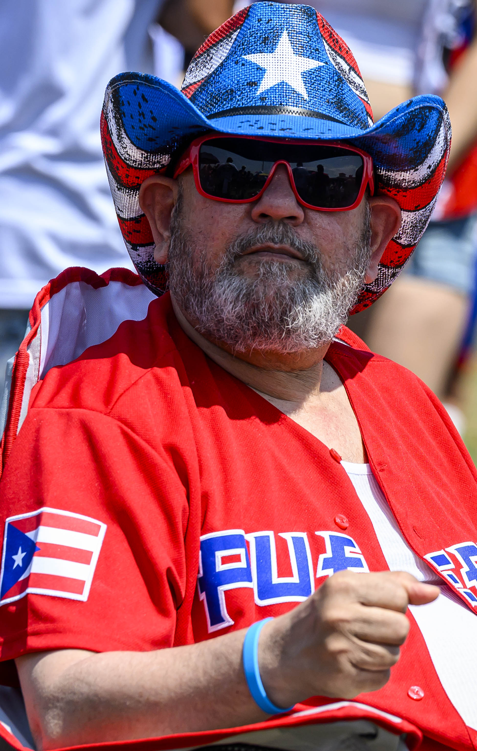 People celebrate during the annual Lehigh Valley Puerto Rican Day Festival on Sunday, July 19, 2026, at the Allentown Fairgrounds. The day's festivities, sponsored by Puertorrican Cultural Preservation, also included raising the Puerto Rican flag and a parade. (April Gamiz/The Morning Call)