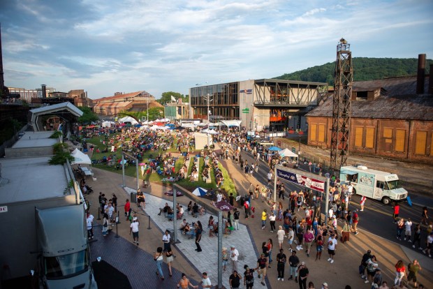 Festivalgoers enjoy the sights and sounds of the One Earth Festival Global Music and Culture Festival at SteelStacks on Saturday July 11 2026. The fifth annual festival, presented by ArtsQuest in partnership with Movement Moves Media, celebrates global music, culture and community. (Jonathan Broady/Special to The Morning Call)