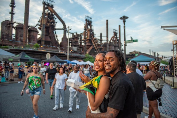 Festivalgoers enjoy the sights and sounds of the One Earth Festival Global Music and Culture Festival at SteelStacks on Saturday July 11 2026. The fifth annual festival, presented by ArtsQuest in partnership with Movement Moves Media, celebrates global music, culture and community. (Jonathan Broady/Special to The Morning Call)