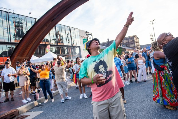 Festivalgoers enjoy the sights and sounds of the One Earth Festival Global Music and Culture Festival at SteelStacks on Saturday July 11 2026. The fifth annual festival, presented by ArtsQuest in partnership with Movement Moves Media, celebrates global music, culture and community. (Jonathan Broady/Special to The Morning Call)