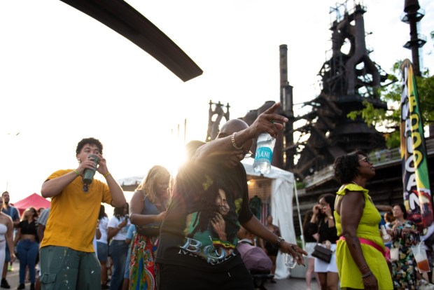 Festivalgoers enjoy the sights and sounds of the One Earth Festival Global Music and Culture Festival at SteelStacks on Saturday July 11 2026. The fifth annual festival, presented by ArtsQuest in partnership with Movement Moves Media, celebrates global music, culture and community. (Jonathan Broady/Special to The Morning Call)