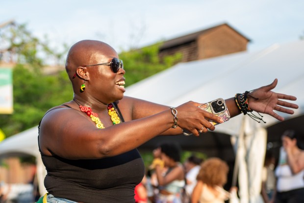 Festivalgoers enjoy the sights and sounds of the One Earth Festival Global Music and Culture Festival at SteelStacks on Saturday July 11 2026. The fifth annual festival, presented by ArtsQuest in partnership with Movement Moves Media, celebrates global music, culture and community. (Jonathan Broady/Special to The Morning Call)