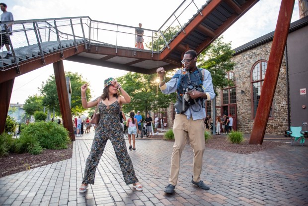 Festivalgoers enjoy the sights and sounds of the One Earth Festival Global Music and Culture Festival at SteelStacks on Saturday July 11 2026. The fifth annual festival, presented by ArtsQuest in partnership with Movement Moves Media, celebrates global music, culture and community. (Jonathan Broady/Special to The Morning Call)