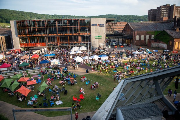 Festivalgoers enjoy the sights and sounds of the One Earth Festival Global Music and Culture Festival at SteelStacks on Saturday July 11 2026. The fifth annual festival, presented by ArtsQuest in partnership with Movement Moves Media, celebrates global music, culture and community. (Jonathan Broady/Special to The Morning Call)