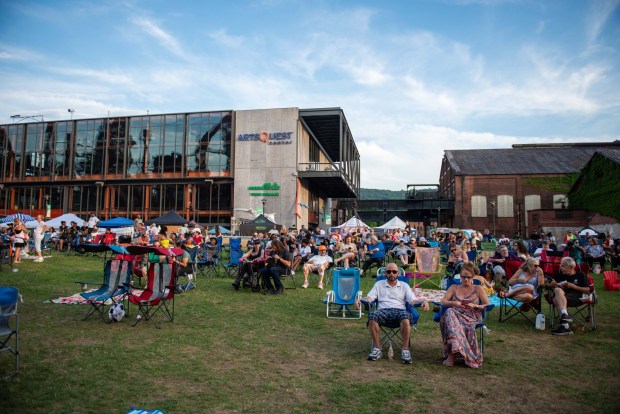 Festivalgoers enjoy the sights and sounds of the One Earth Festival Global Music and Culture Festival at SteelStacks on Saturday July 11 2026. The fifth annual festival, presented by ArtsQuest in partnership with Movement Moves Media, celebrates global music, culture and community. (Jonathan Broady/Special to The Morning Call)