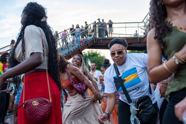 Festivalgoers enjoy the sights and sounds of the One Earth Festival Global Music and Culture Festival at SteelStacks on Saturday July 11 2026. The fifth annual festival, presented by ArtsQuest in partnership with Movement Moves Media, celebrates global music, culture and community. (Jonathan Broady/Special to The Morning Call)