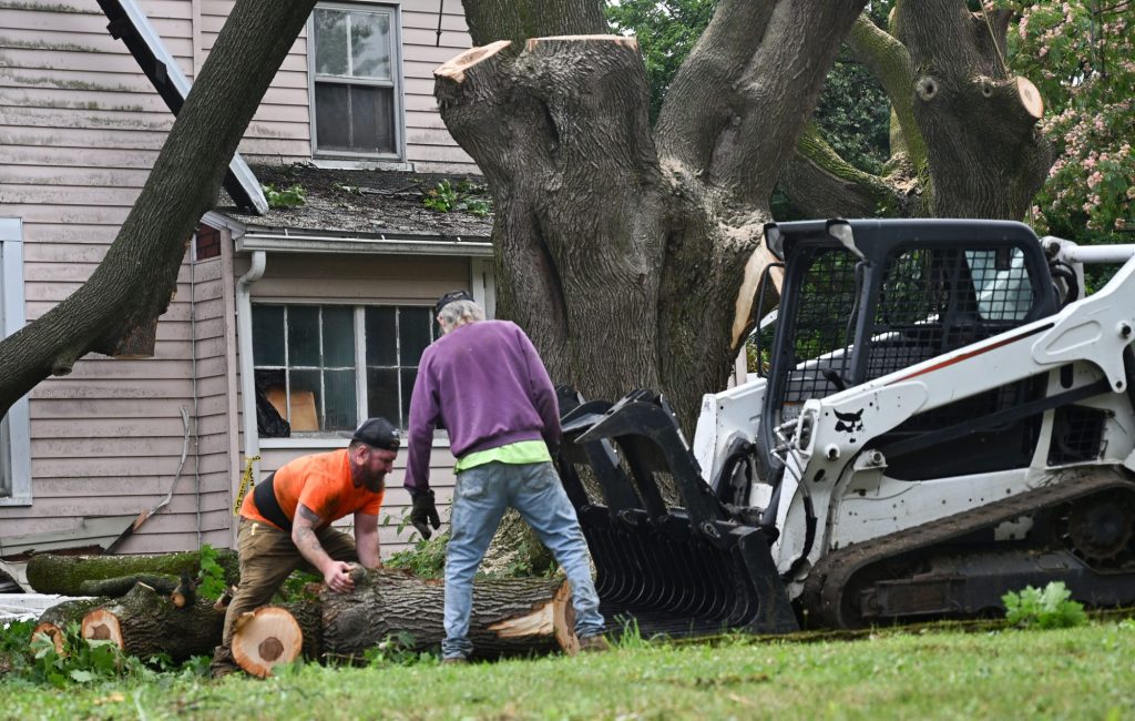 Crews clear debris and repair power lines