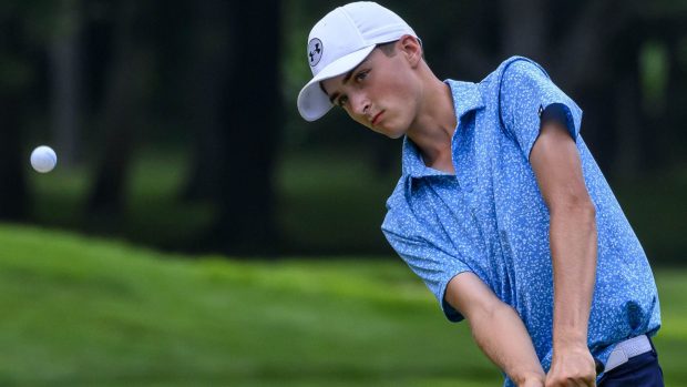 Nazareth junior Dane Mohap chips to the par-4 15th green Tuesday at the 78th annual U.S. Junior Amateur tournament at Saucon Valley Country Club's Grace Course in Upper Saucon Township. (April Gamiz/The Morning Call)