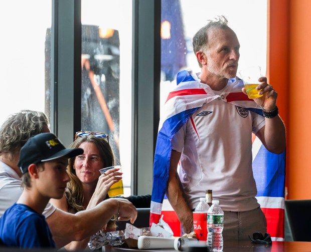 England fan Craig Andrews of Milford, N.J., watches the FIFA World Cup semifinal match between England and Argentina on Wednesday, July 15, 2026, during a Lehigh Valley SoccerFest viewing party at ArtsQuest in Bethlehem. The game was held at Atlanta Stadium in Georgia. Argentina won and will play Spain in the final on Sunday, July 19. (April Gamiz/The Morning Call)