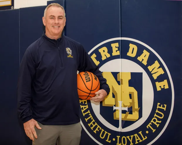 Notre Dame-Green Pond boys basketball coach Pat Boyle, this season's coach of the year, poses on Monday, April 6, 2026, at Notre Dame-Green Pond in Bethlehem. (Jane Therese/Special to The Morning Call)